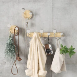 Umbra Melody Seinänaulakko 9-koukkua Luonnonväri/nikkeli 10 Umbra Melody Seinänaulakko 9-koukkua Luonnonväri/nikkeli -Yleinen Kotikauppa Umbra melody seinanaulakko 9 koukkua lv nikkeli 2