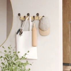 Umbra Melody Seinänaulakko 9-koukkua Luonnonväri/nikkeli 11 Umbra Melody Seinänaulakko 9-koukkua Luonnonväri/nikkeli -Yleinen Kotikauppa Umbra melody seinanaulakko 9 koukkua lv nikkeli 4